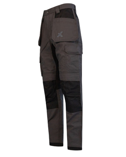 Grey Black Coloured Xpert Mens Core Stretch Work Trousers on Outdoor Background
