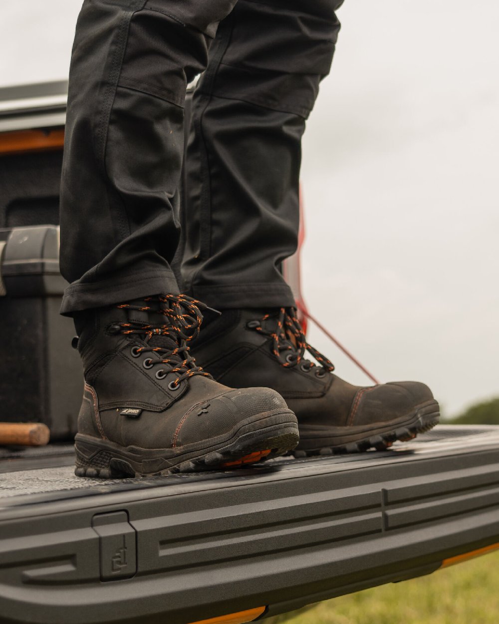 Black Coloured Xpert Mens Pro Raptor Waterproof Safety Boots on Outdoor Background

