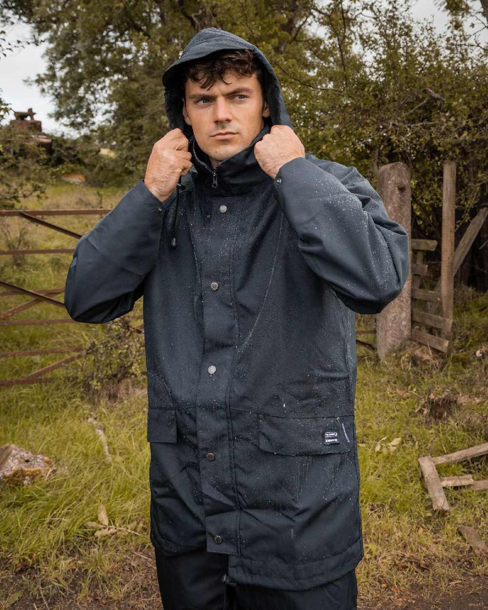 Navy Coloured Xpert Mens Swampmaster No-Sweat Xtremegear Waterproof Jacket on Outdoor Background
