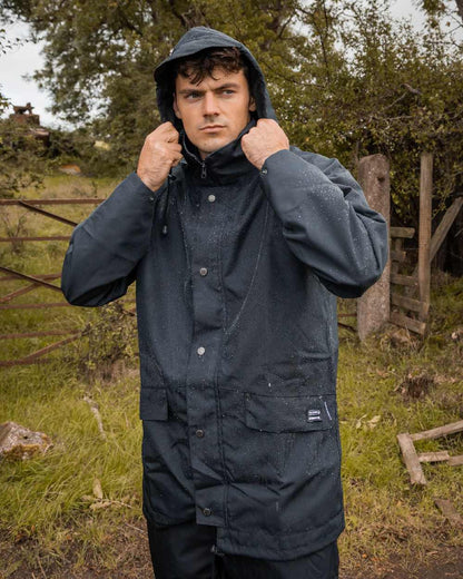 Navy Coloured Xpert Mens Swampmaster No-Sweat Xtremegear Waterproof Jacket on Outdoor Background
