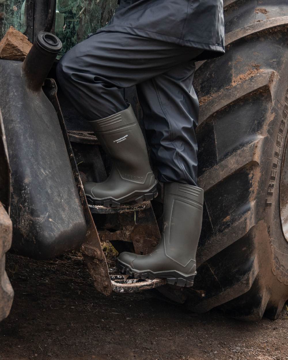 Green Coloured Xpert Mens Swampmaster Pro Thermo S5 Safety Wellingtons on Outdoor Background
