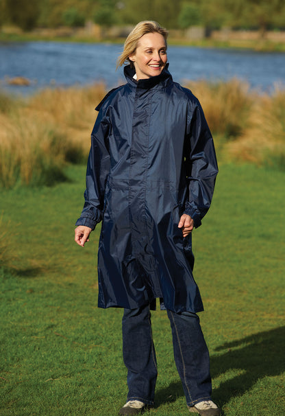 Ladies Champion Storm full length Waterproof packamac with scenic  background.