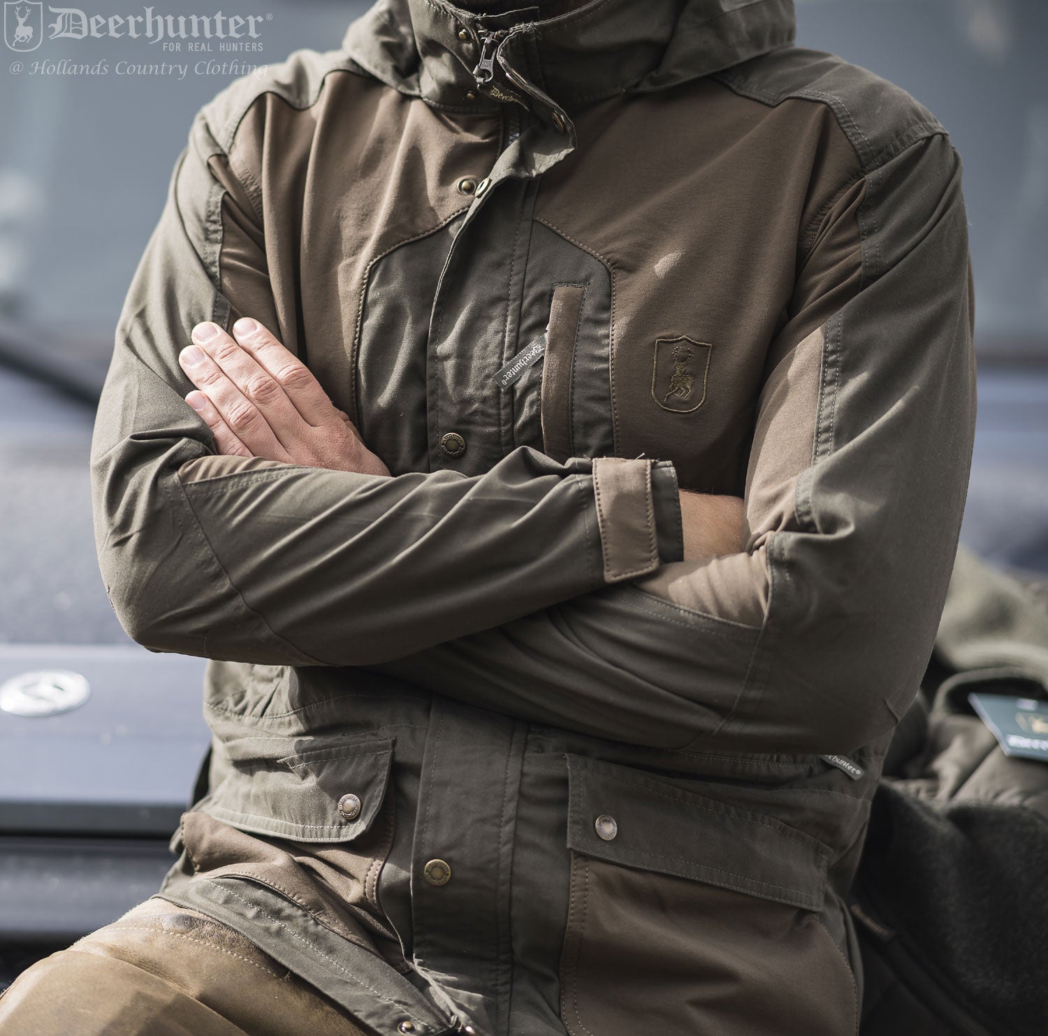 man wearing Deerhunter Strike Jacket Long | Deep Green