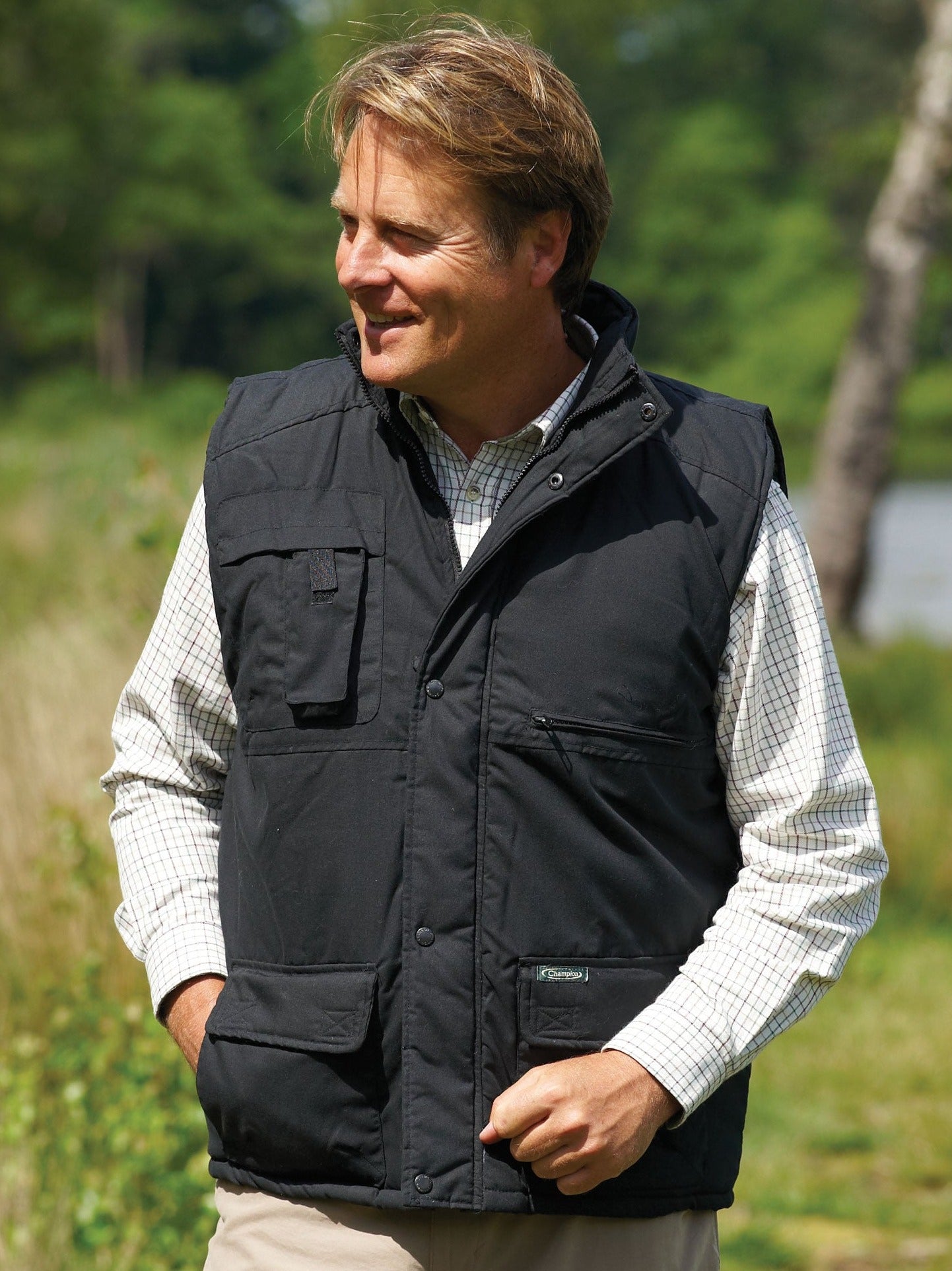 man wearing Champion Peak Multi-Pocket Padded Body warmer 