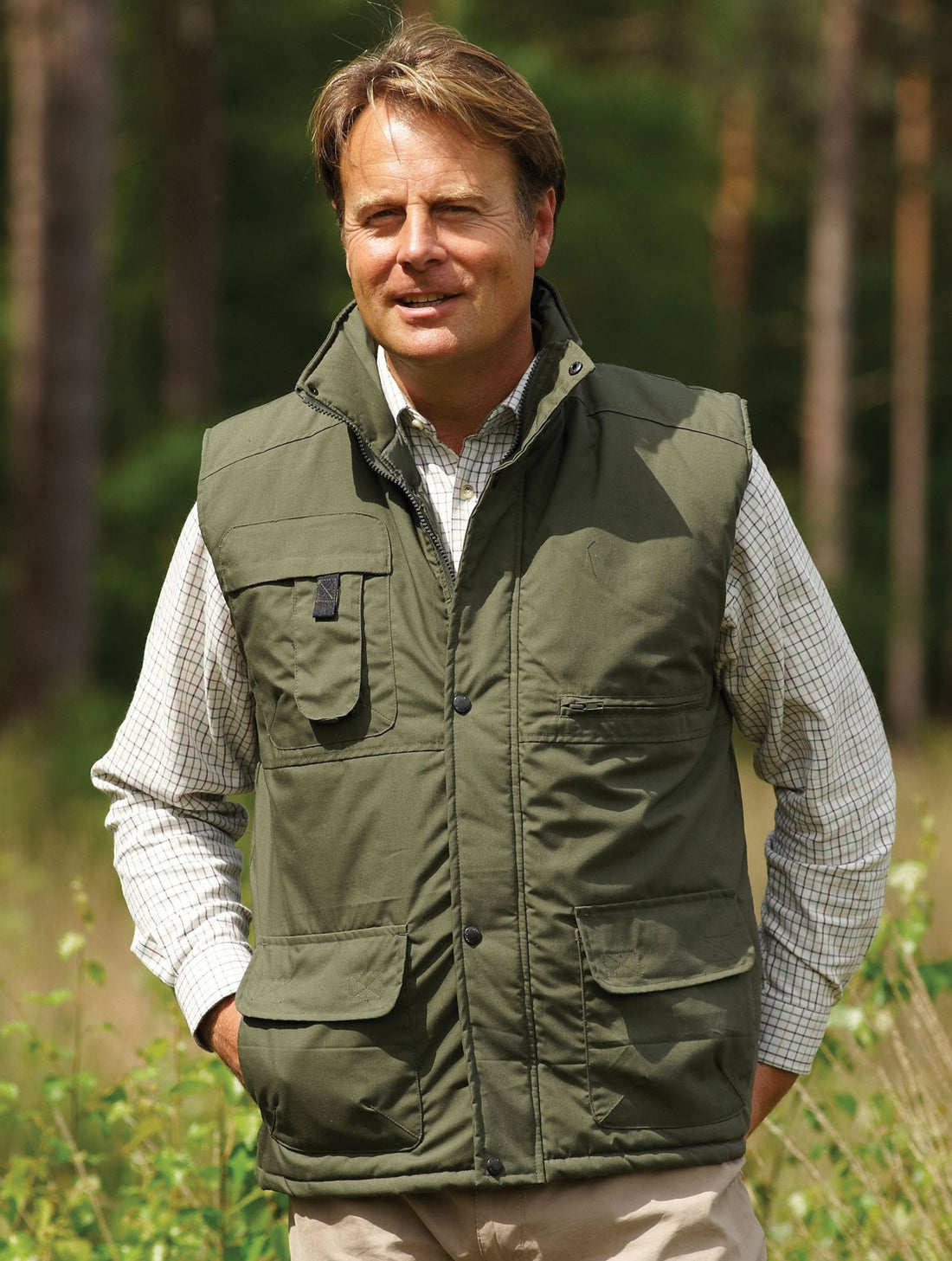 man wearing green Champion Peak Multi-Pocket Padded Body warmer 