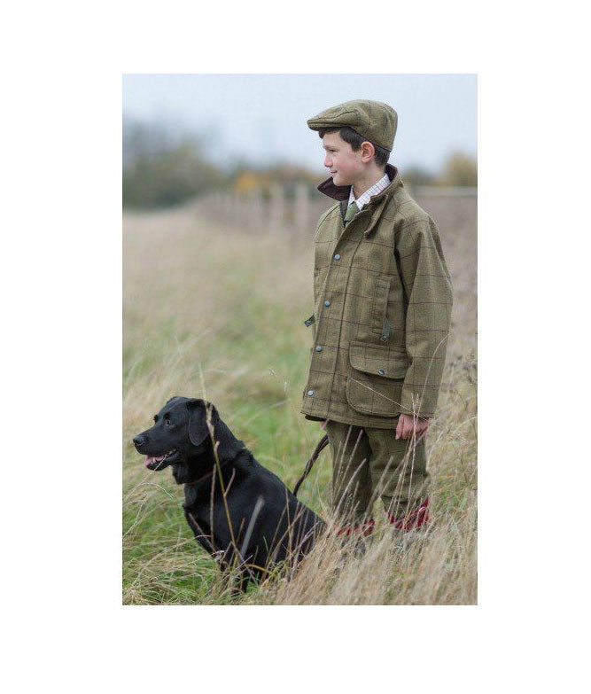 Child in Tweed with Black Labrador