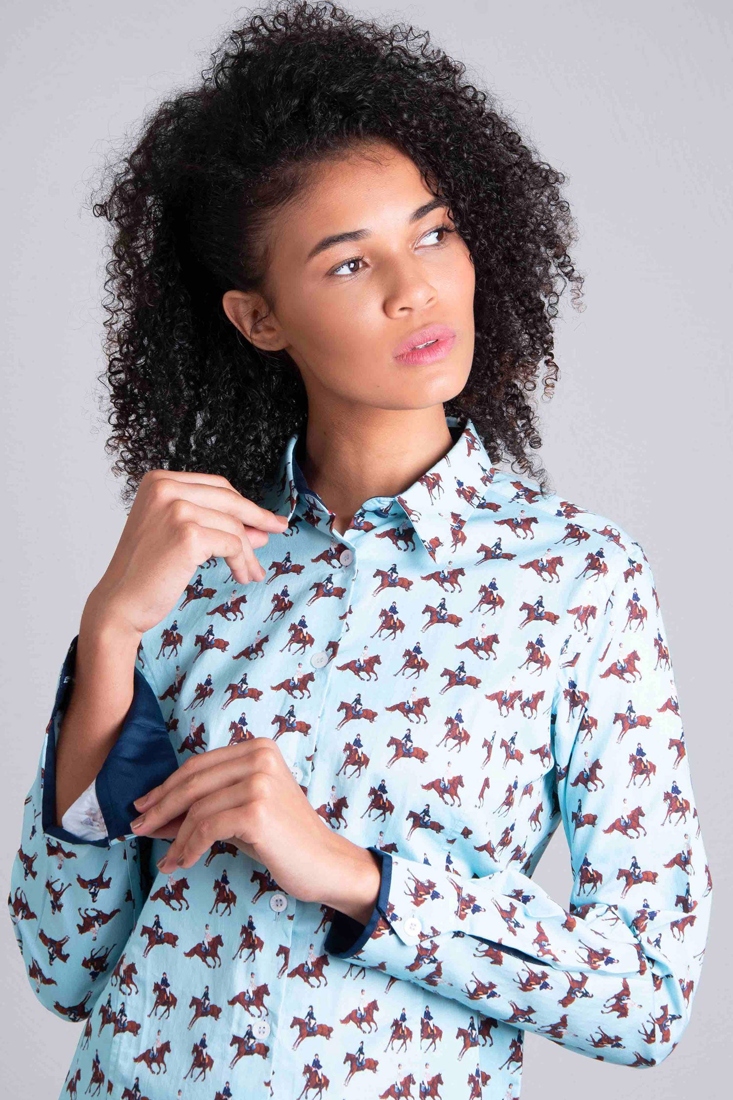 Ladies shirt in blue with Horses and Riders pattern