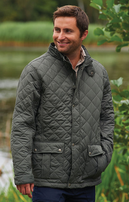 man wearing Champion Padstow Diamond Quilted Jacket  