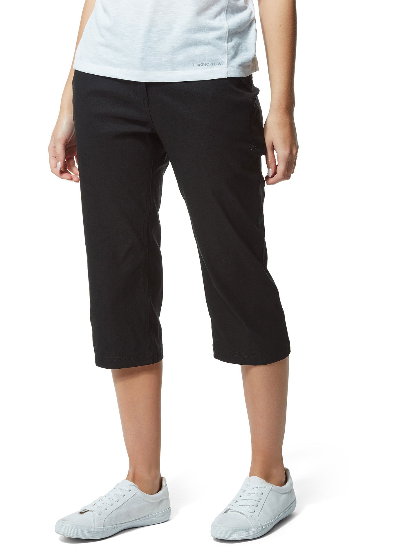 Lady wears Black Craghoppers Kiwi Pro Crop II Trousers