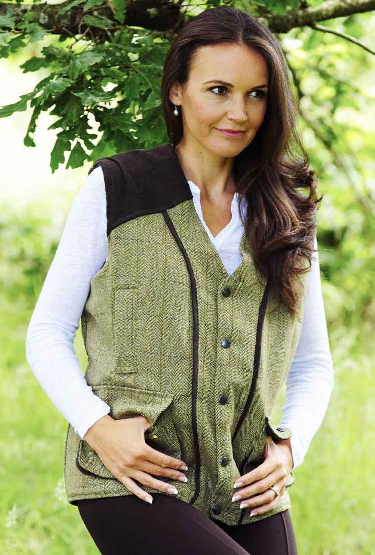 Light Tweed With Check Bronte Derby Tweed Field Waistcoat on tree background 