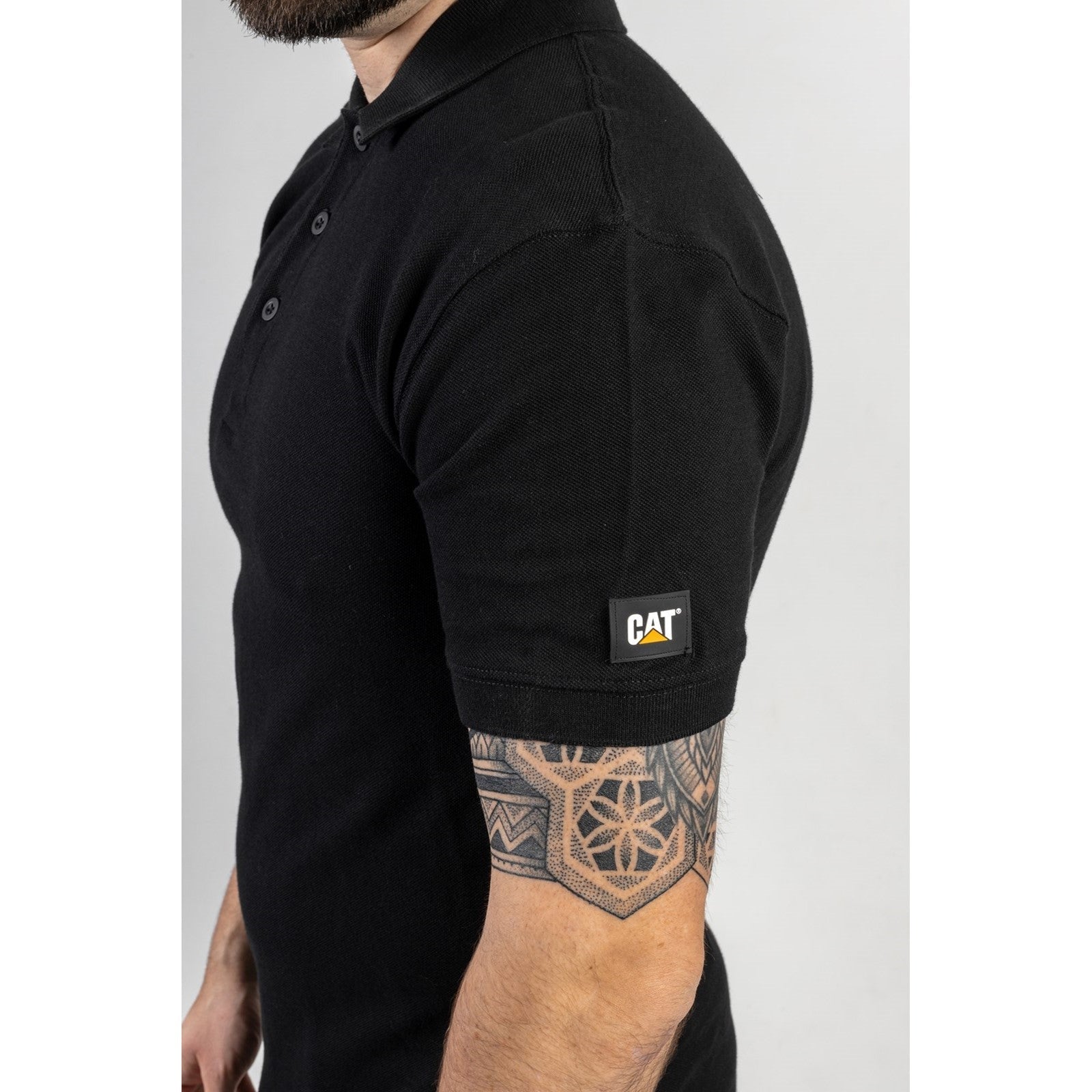 Caterpillar Essentials Polo Shirt. Black. Side View 