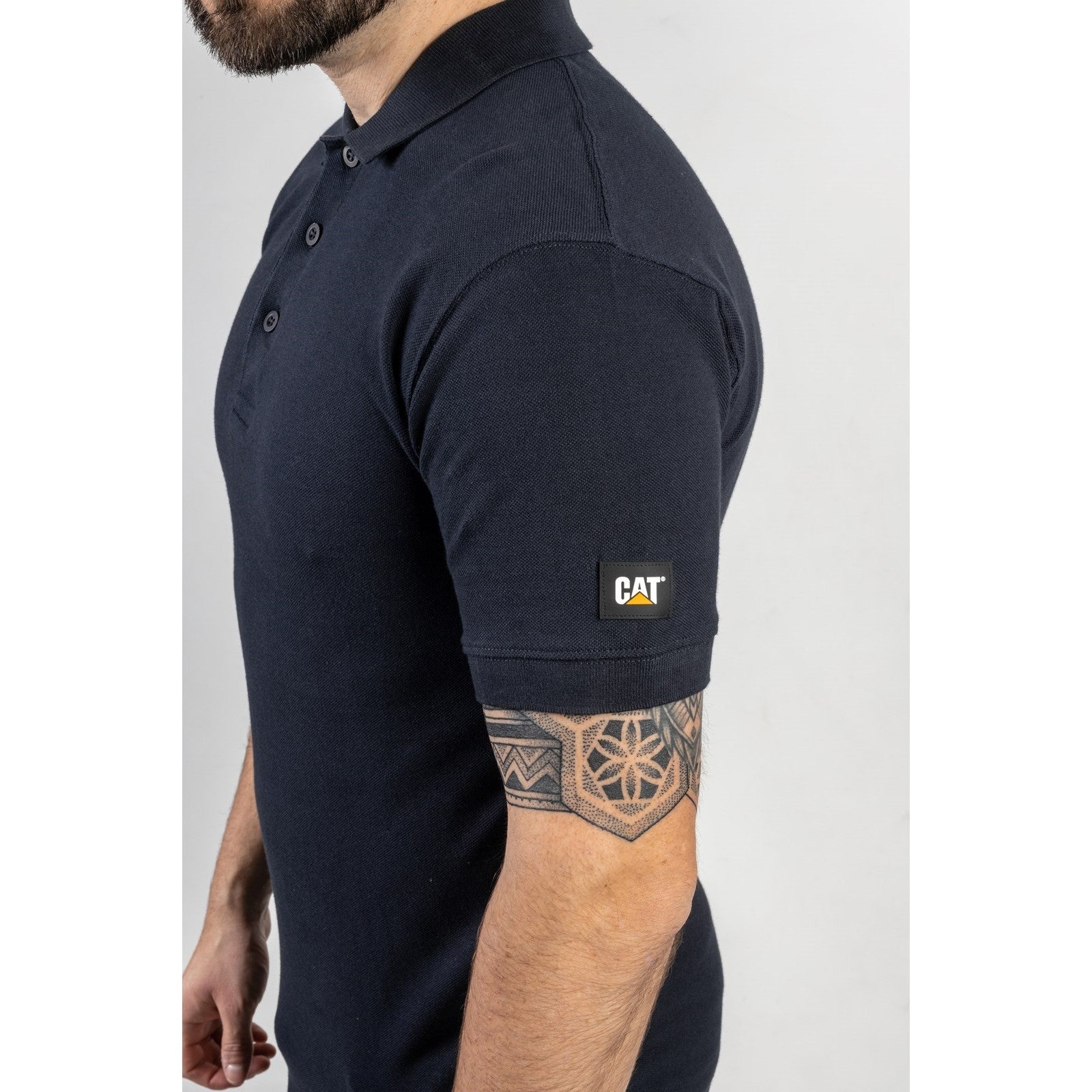 Caterpillar Essentials Polo Shirt. Navy. Side view 