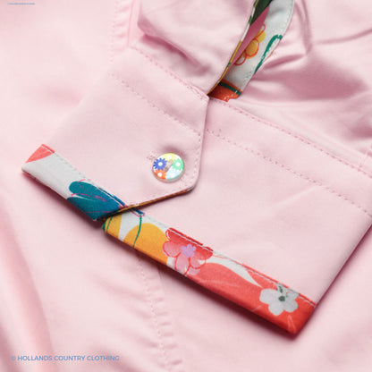 pink shirt cuff and flower trim