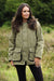 woman wearing bronte Classic Country Tweed Field Shooting jacket #colour_light-tweed-with-check