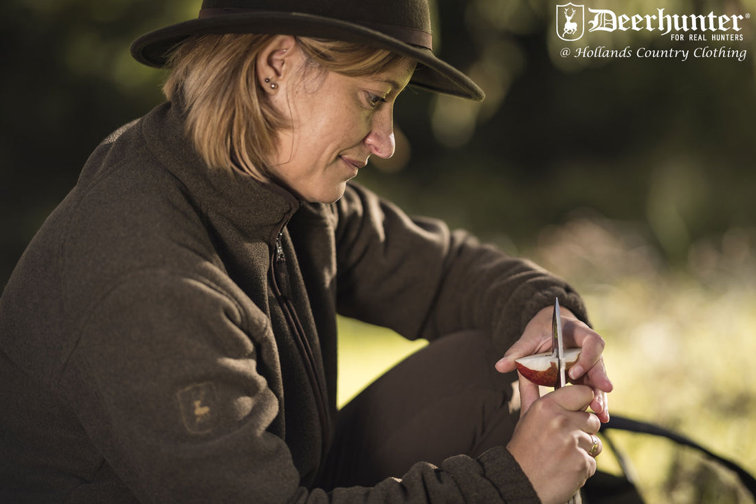 Lady wearing a country fleece by deerhunter