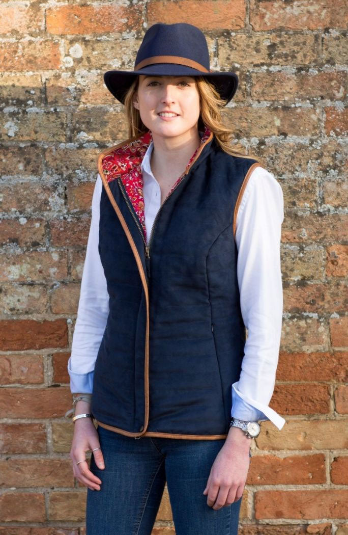 woman in hat wears Alan Paine Felwell Quilted Gilet