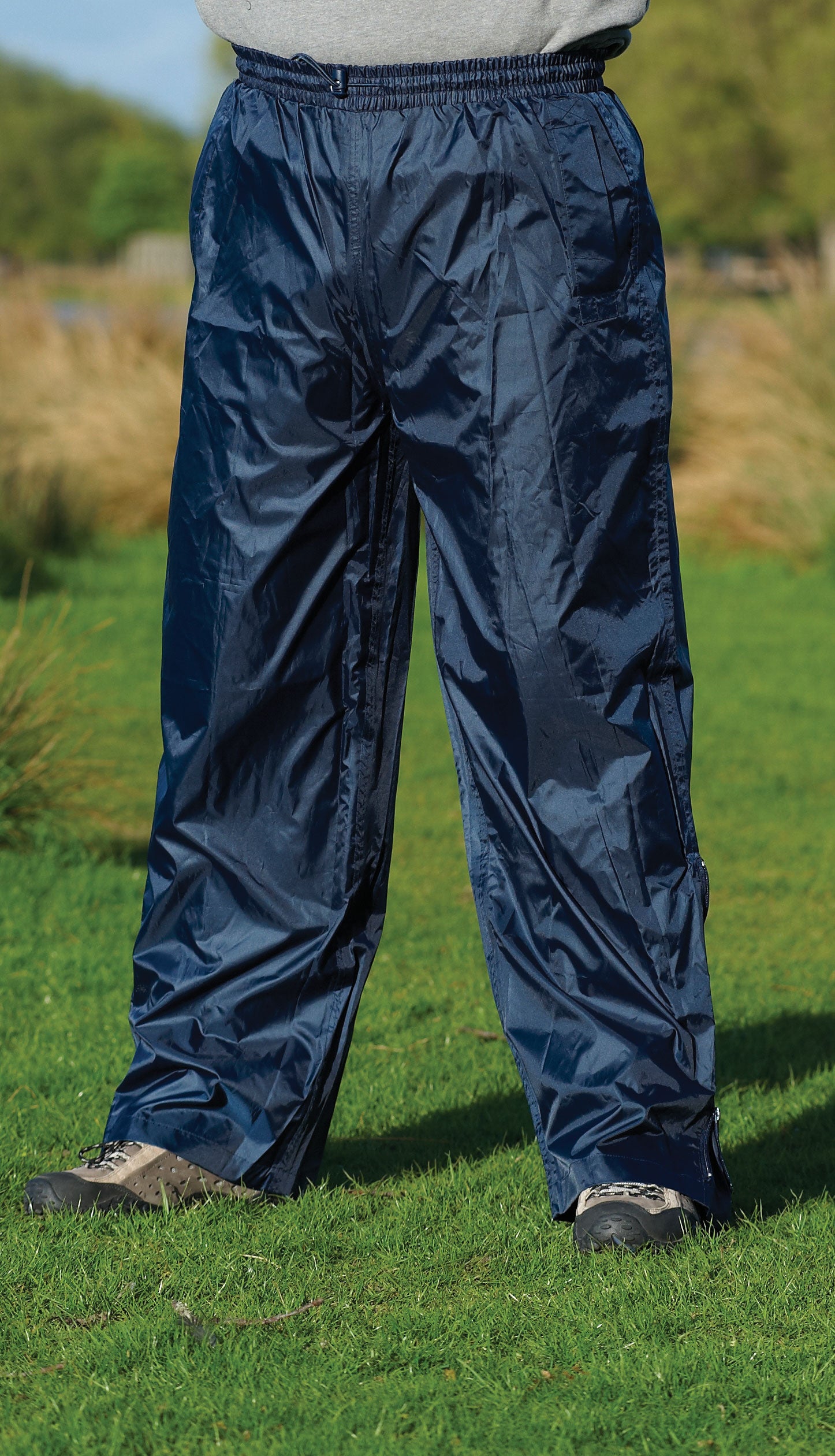 man wearing Champion Typhoon Waterproof Trousers	 navy