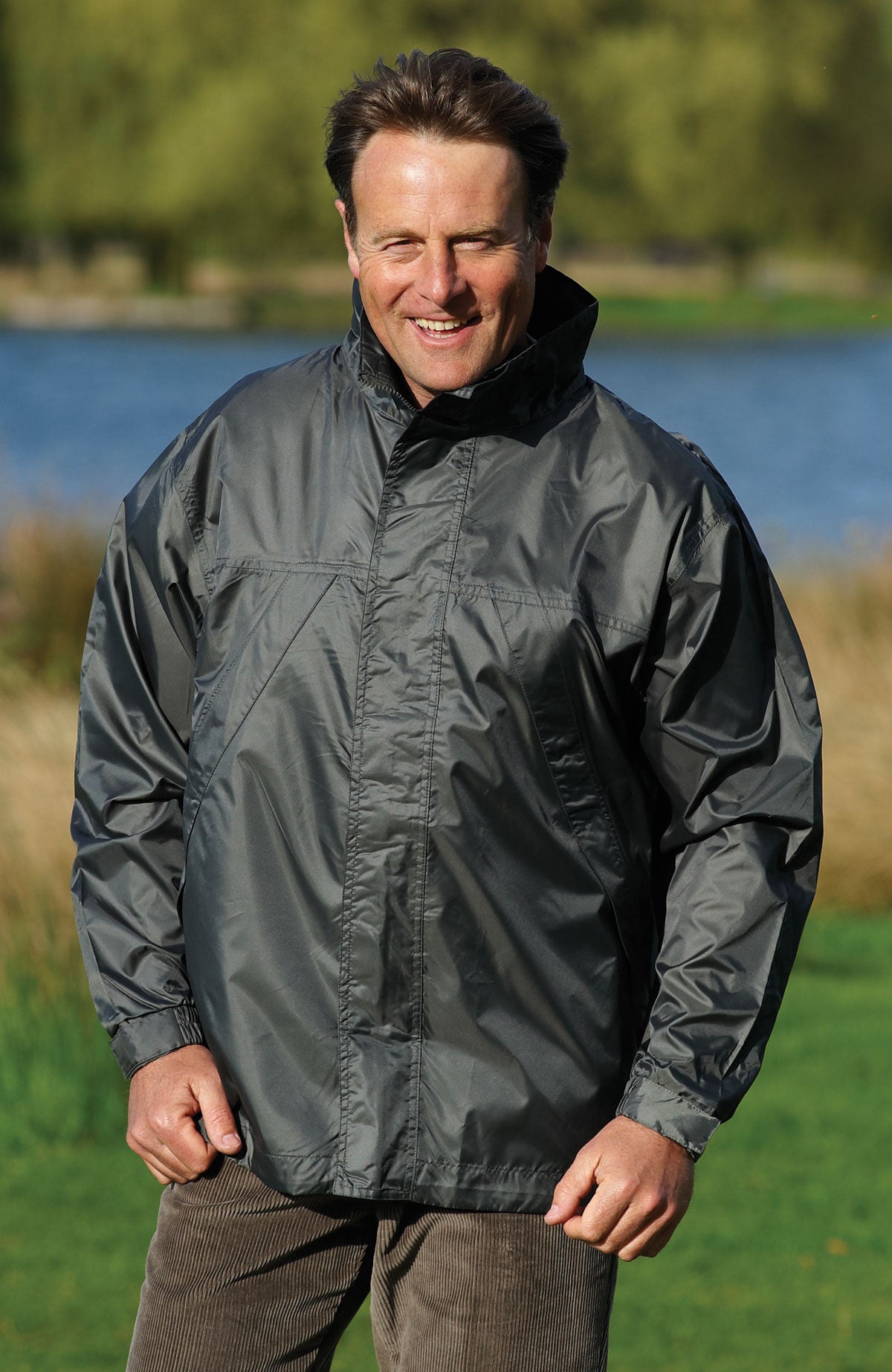man wearing Champion Typhoon Waterproof Shell Jacket olive 